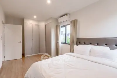 Spacious bedroom with modern design and natural light