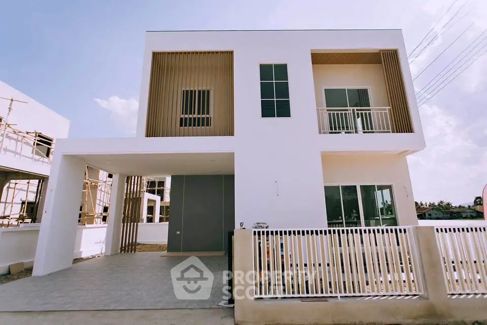 Modern two-story house with minimalist design and spacious balcony