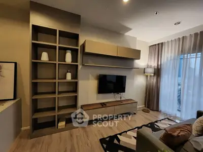 Modern living room with stylish shelving and wall-mounted TV