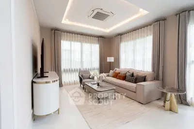 Elegant living room with modern decor and natural light