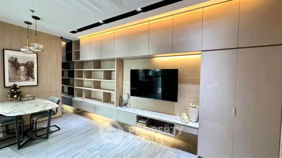 Modern living room with sleek built-in cabinets and stylish dining area