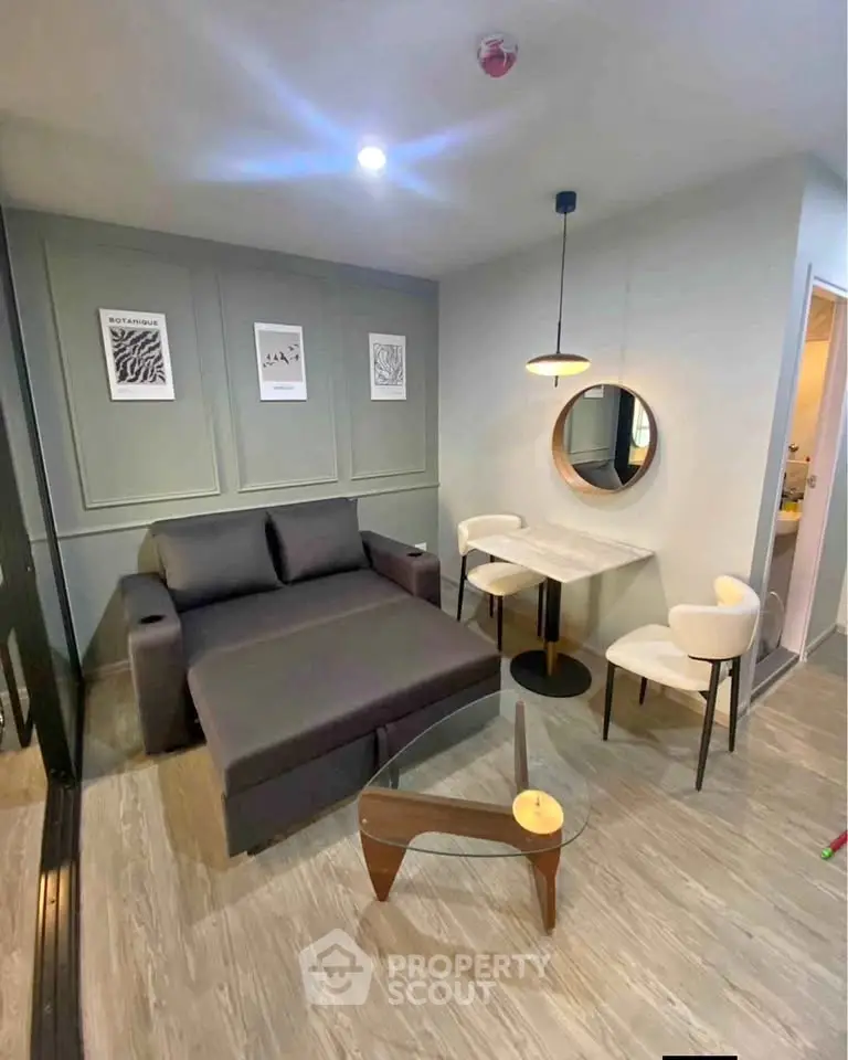 Modern living room with stylish furniture and elegant decor, perfect for urban living.