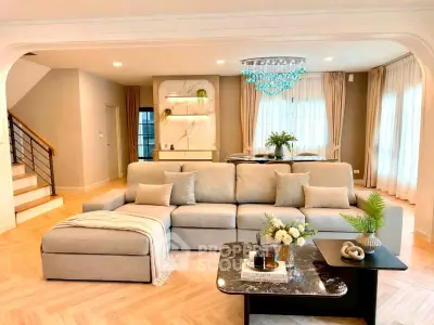 Luxurious living room with elegant decor and spacious seating area