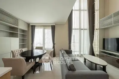 Luxurious modern living room with high ceilings and elegant furniture