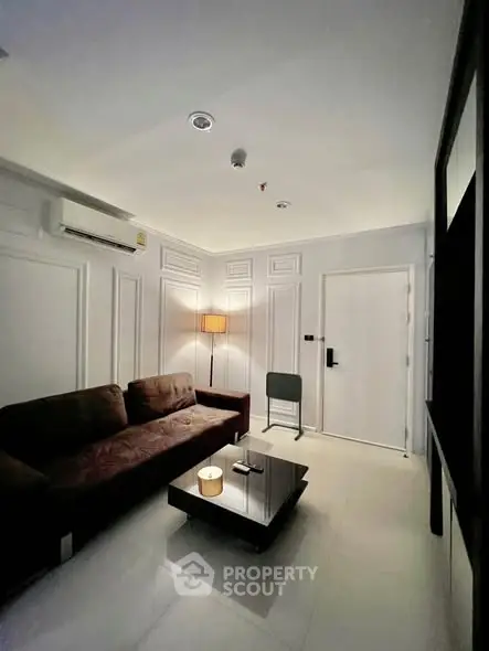 Modern living room with sleek furniture and ambient lighting