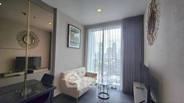 Modern living room with city view, stylish decor, and natural light.