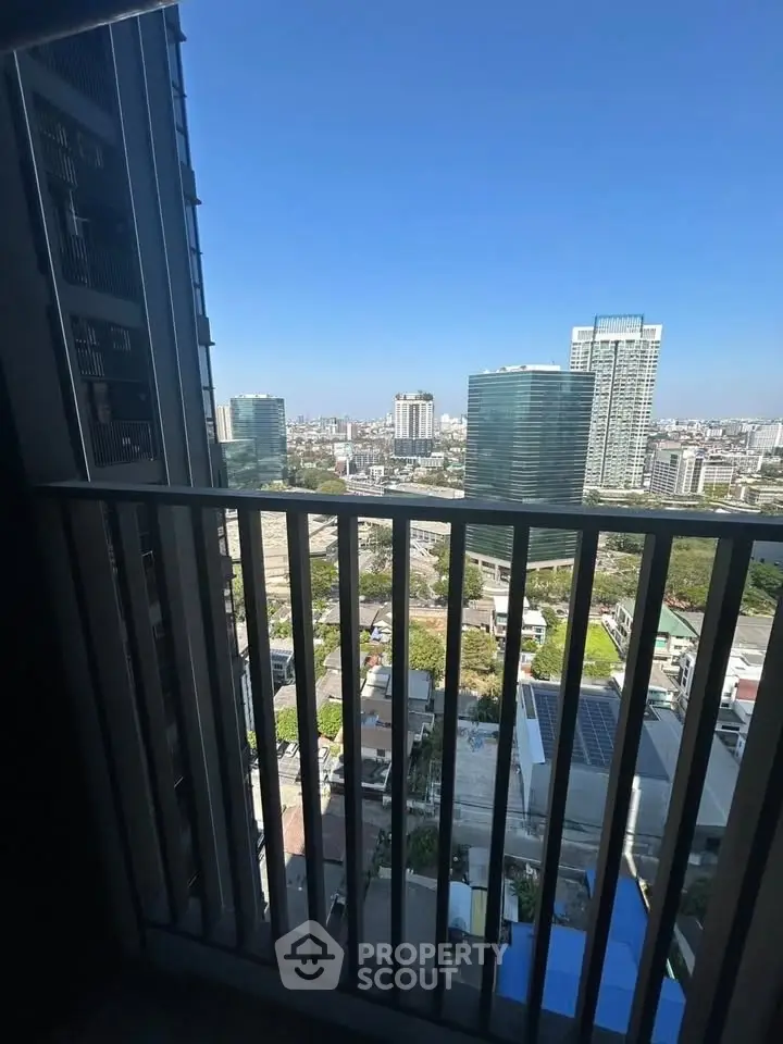 Stunning cityscape view from a high-rise balcony, perfect for urban living enthusiasts.