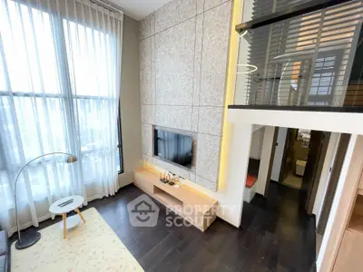 Modern duplex living room with high ceilings and stylish decor