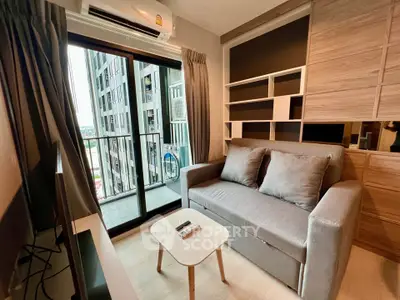 Modern living room with balcony view in high-rise apartment