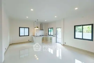 Spacious modern kitchen with open layout and sleek design