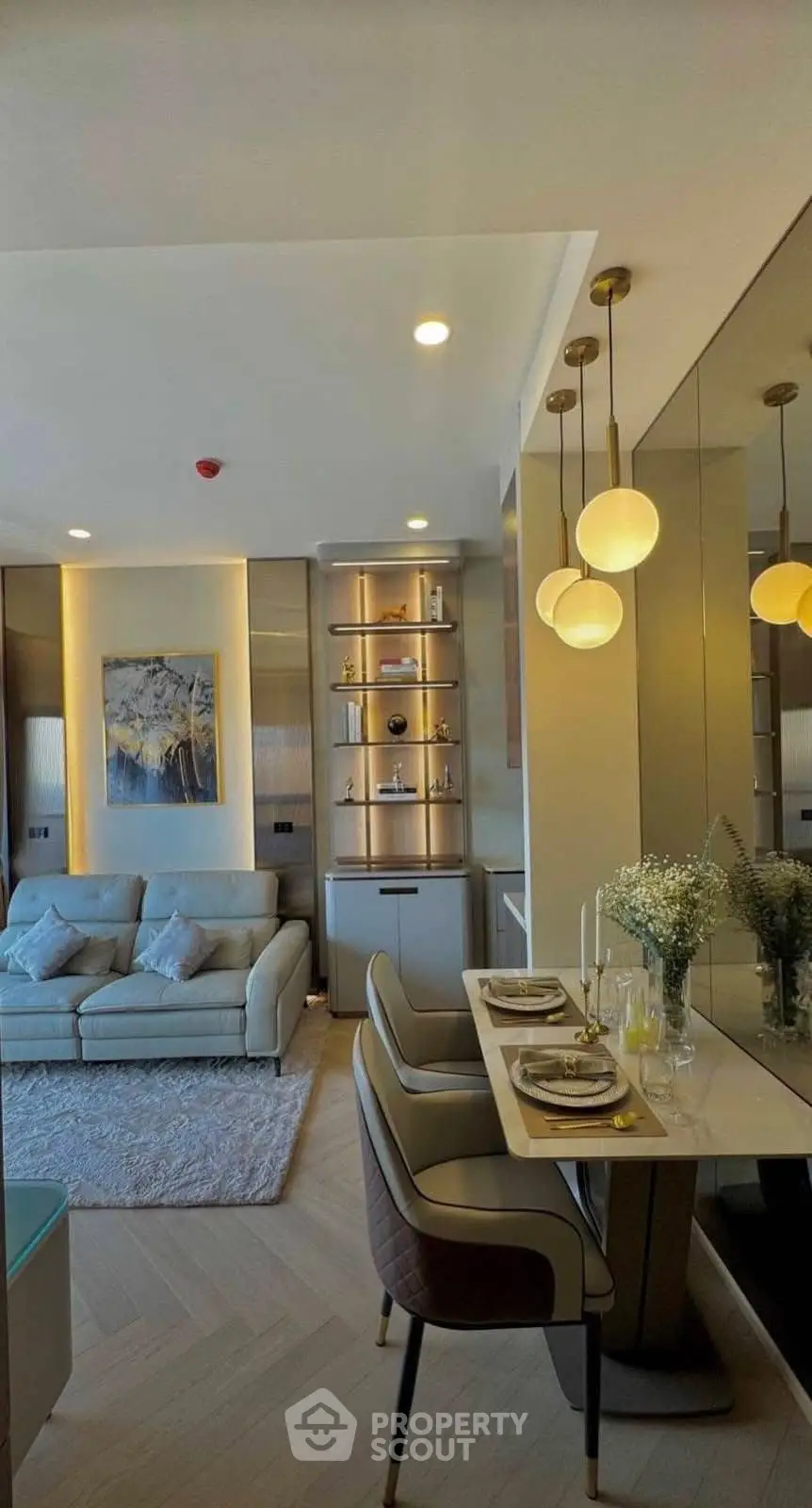 Modern living room with elegant dining area and stylish decor