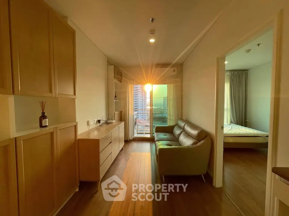 Modern apartment living room with sunset view and cozy bedroom