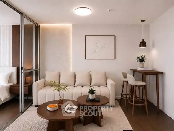Modern living room with elegant decor and cozy seating area, perfect for relaxation and entertaining.