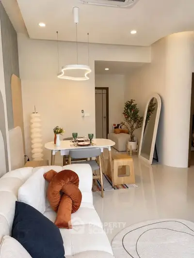 Stylish modern living room with elegant decor and cozy seating area, perfect for relaxation and entertaining.