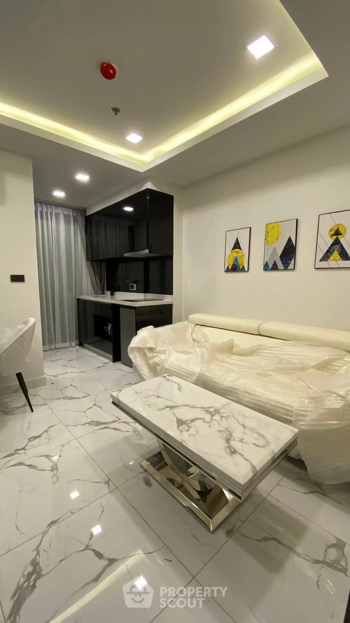 Modern living room with marble flooring and stylish decor