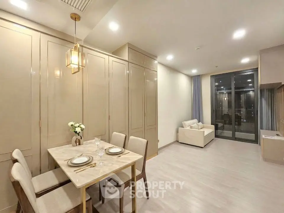 Spacious modern living room with elegant dining area and large windows
