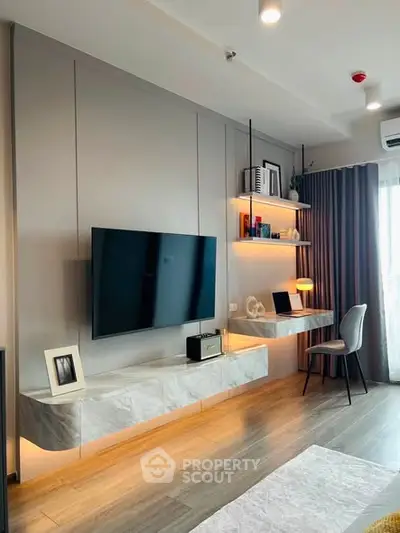 Modern living room with wall-mounted TV and stylish shelving