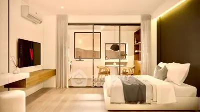 Modern bedroom with open layout and stylish decor, featuring a cozy bed and elegant furnishings.