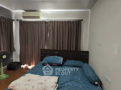 Cozy bedroom with air conditioning and modern decor
