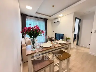 Modern living room with dining area and stylish decor