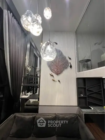 Luxurious modern living room with high ceilings and elegant lighting