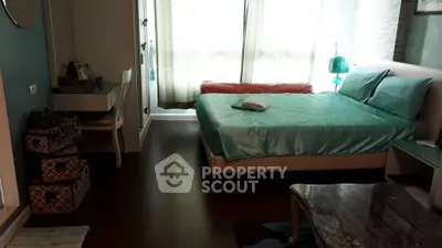 Cozy bedroom with modern decor and natural light