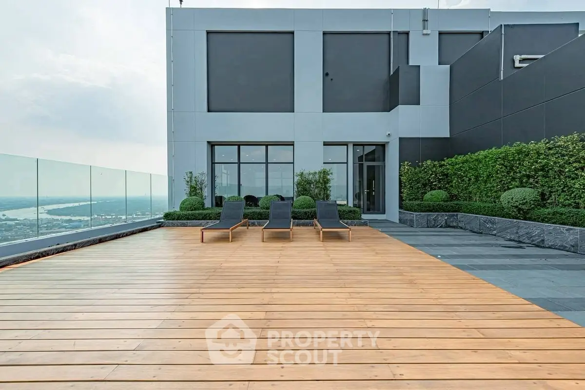 Luxurious rooftop terrace with stunning city view and modern design.