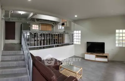 Spacious modern living room with open layout and stylish furniture