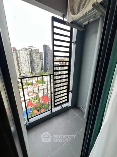 Modern balcony with city view in high-rise apartment
