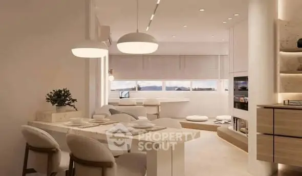 Luxurious open-plan living room with modern dining area and elegant lighting.