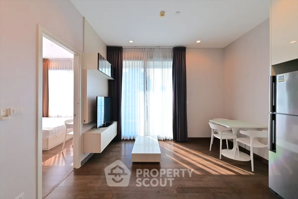 Modern living room with sleek furniture and natural light