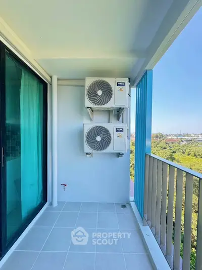 Modern balcony with air conditioning units and scenic view