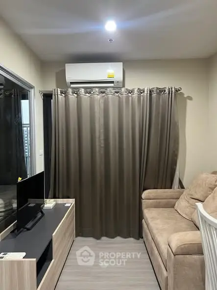 Cozy living room with modern air conditioning and comfortable seating