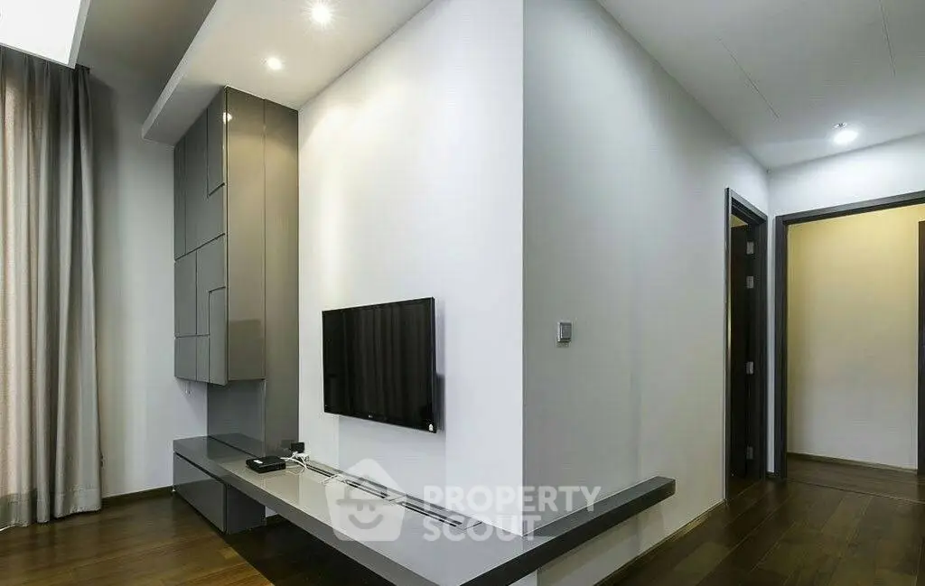 Modern living room with sleek TV setup and stylish decor