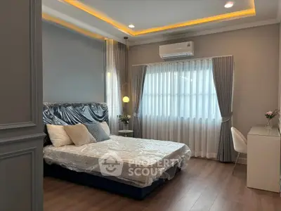 Modern bedroom with elegant decor and natural light