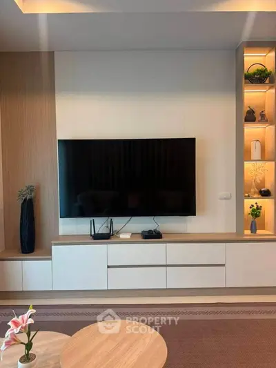 Modern living room with sleek TV setup and stylish decor