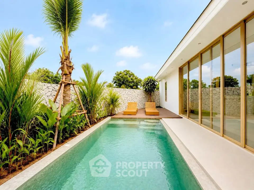 Luxurious modern villa with private pool and lush garden, perfect for relaxation and leisure.