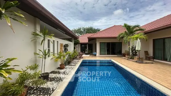 Luxurious villa with private pool and tropical garden, perfect for relaxation and entertainment.