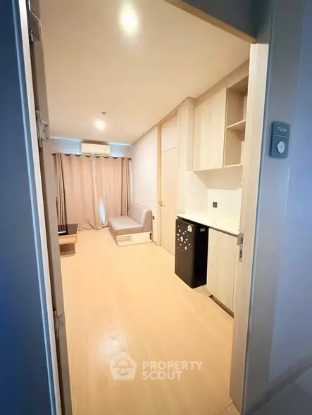 Modern studio apartment with open layout and sleek furnishings