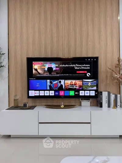 Modern living room with sleek TV setup and stylish decor