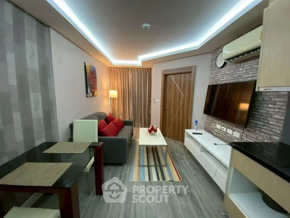 Modern living room with stylish decor and ambient lighting