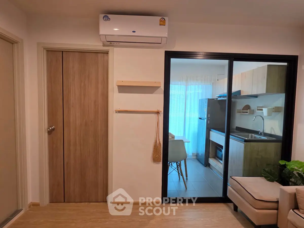 Modern apartment interior with air conditioning and open kitchen layout