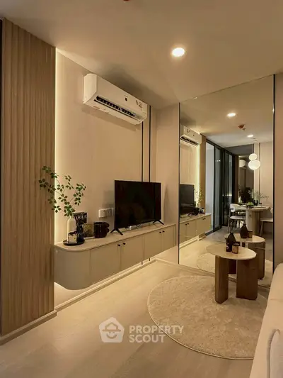 Modern living room with sleek design and ambient lighting
