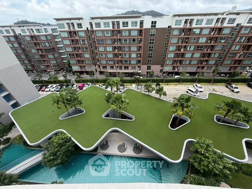 Modern condominium with unique rooftop garden and pool view, showcasing contemporary urban living.