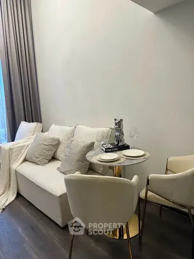 Stylish modern living room with elegant decor and cozy seating area, perfect for relaxation and entertaining.