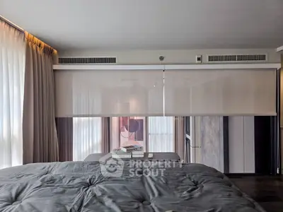 Luxurious modern bedroom with elegant decor and soft lighting