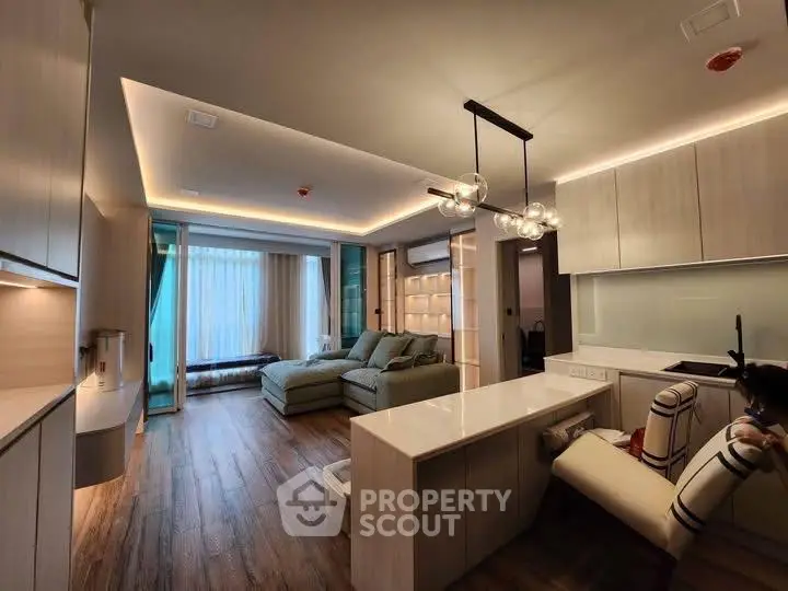 Modern living room with sleek design and ambient lighting