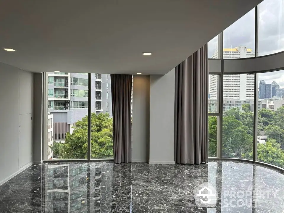 Spacious corner unit with floor-to-ceiling windows and stunning city view.