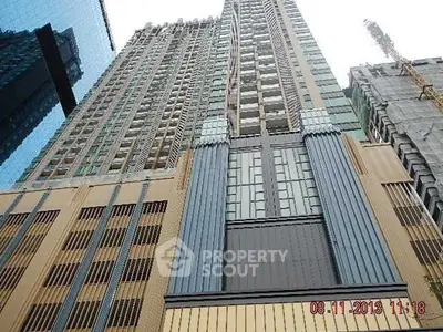 Stunning high-rise building exterior showcasing modern architectural design and urban living.