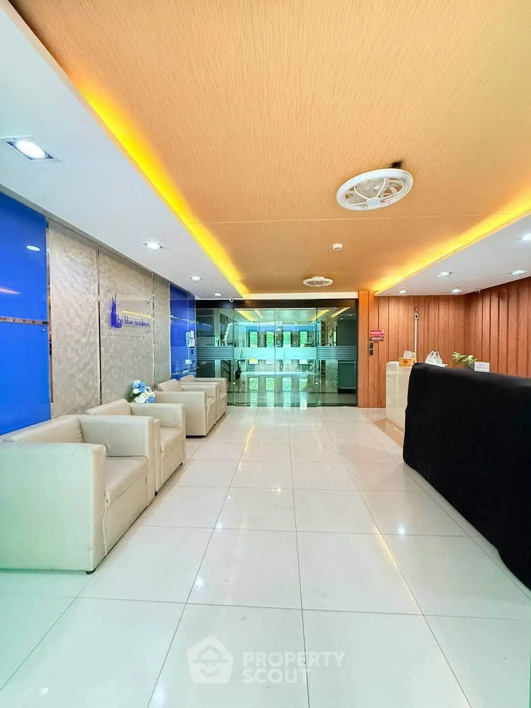 Modern office lobby with sleek design and comfortable seating area